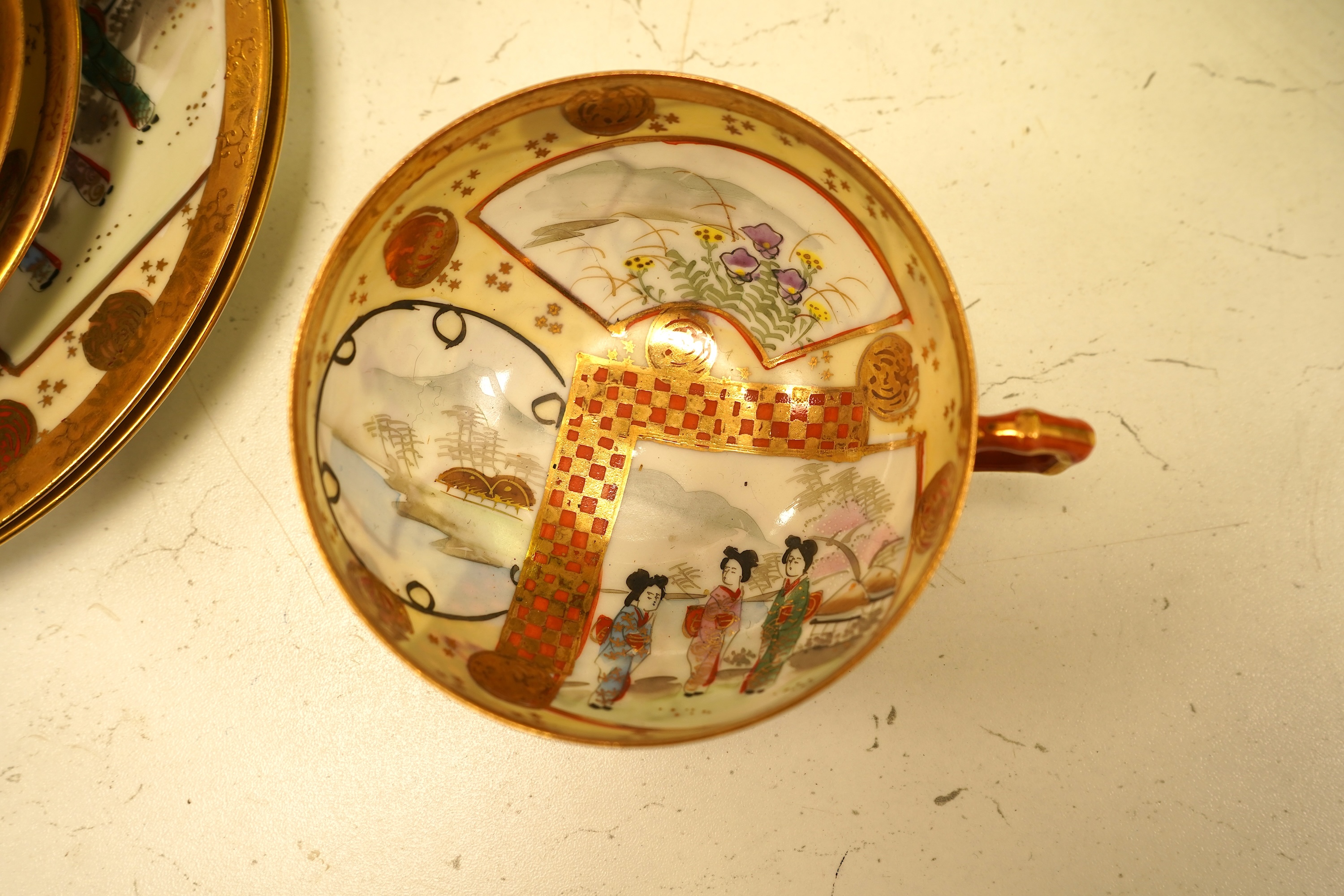 A Japanese Kutani eggshell nine cup part teaset